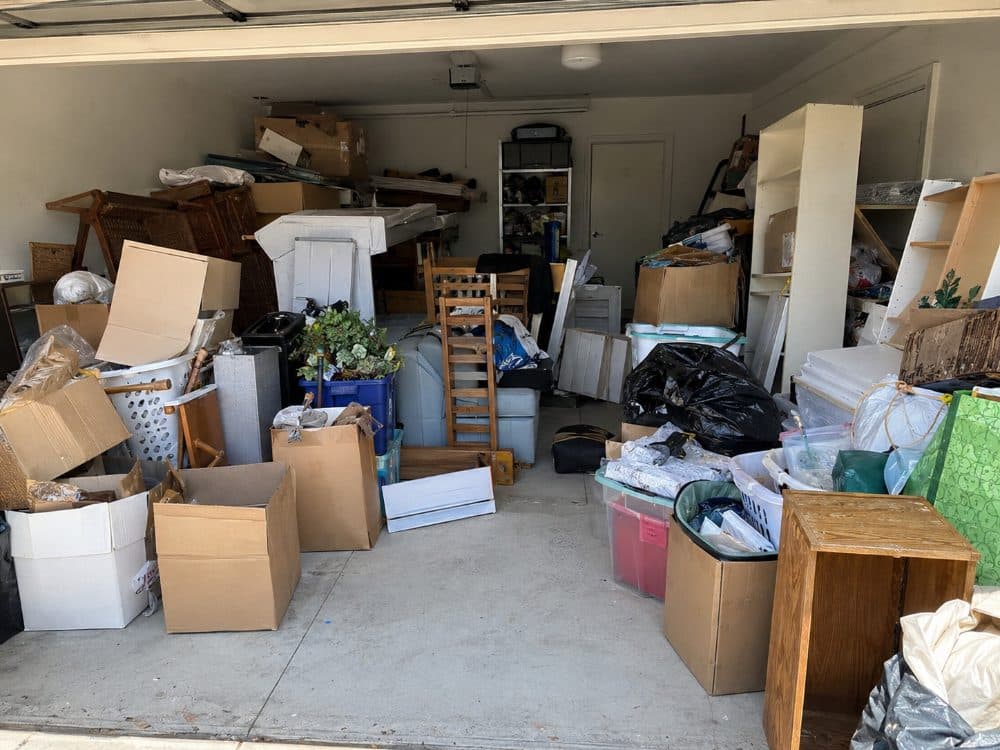 Cluttered garage before clear-out, Robina